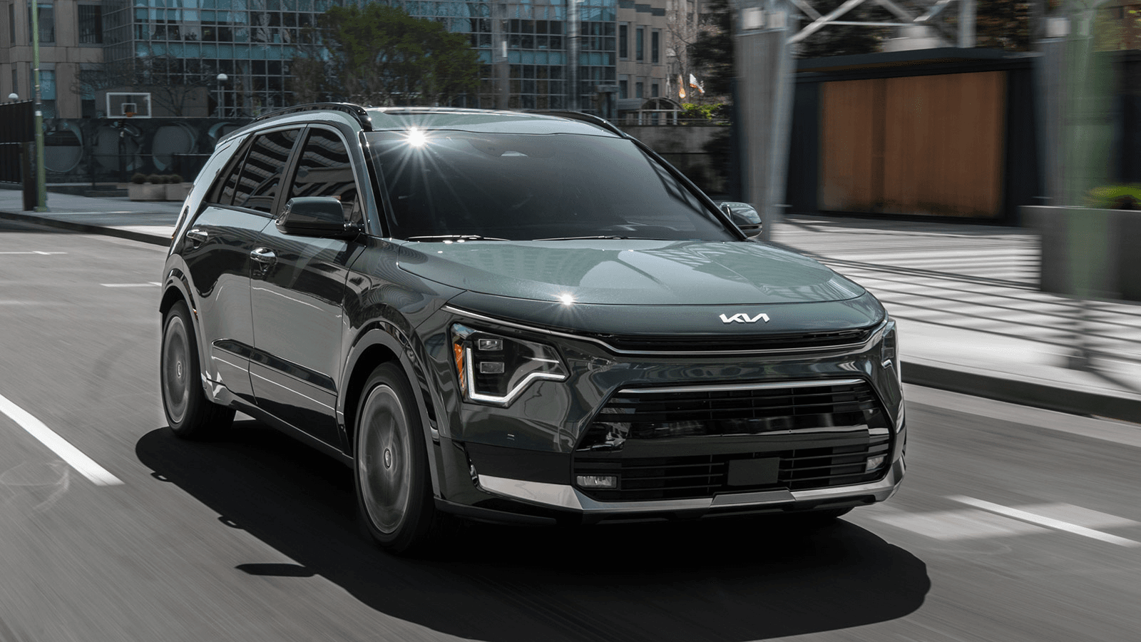 Kia Niro driving through the city
